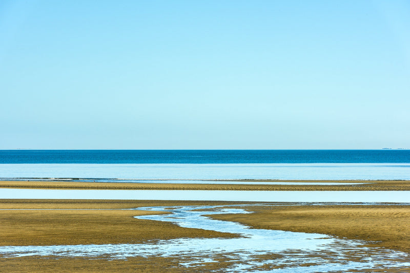 A view across the golden beach to the Tasman Sea.