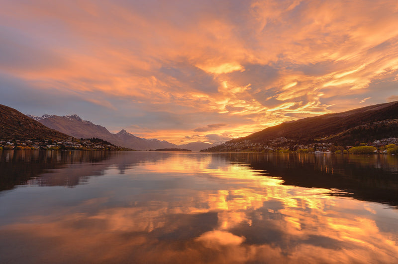 The sunsets behind the mountains overlooking Frankton Arm, Lake Wakatipu, Queenstown