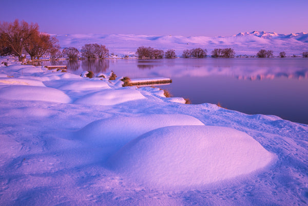 The fresh blanket of snow, hides a vast collection of rowboats frequently used by the local bach owners at Lake Alexandrina in the summertime.