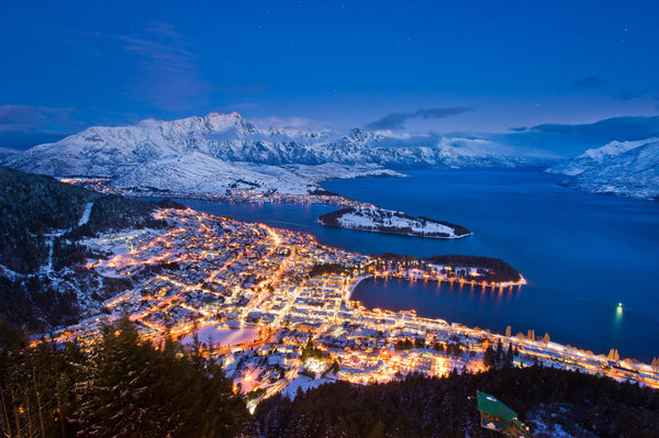 Dusk falls over a snow covered Queenstown, and Lake Wakatipu in August 2011